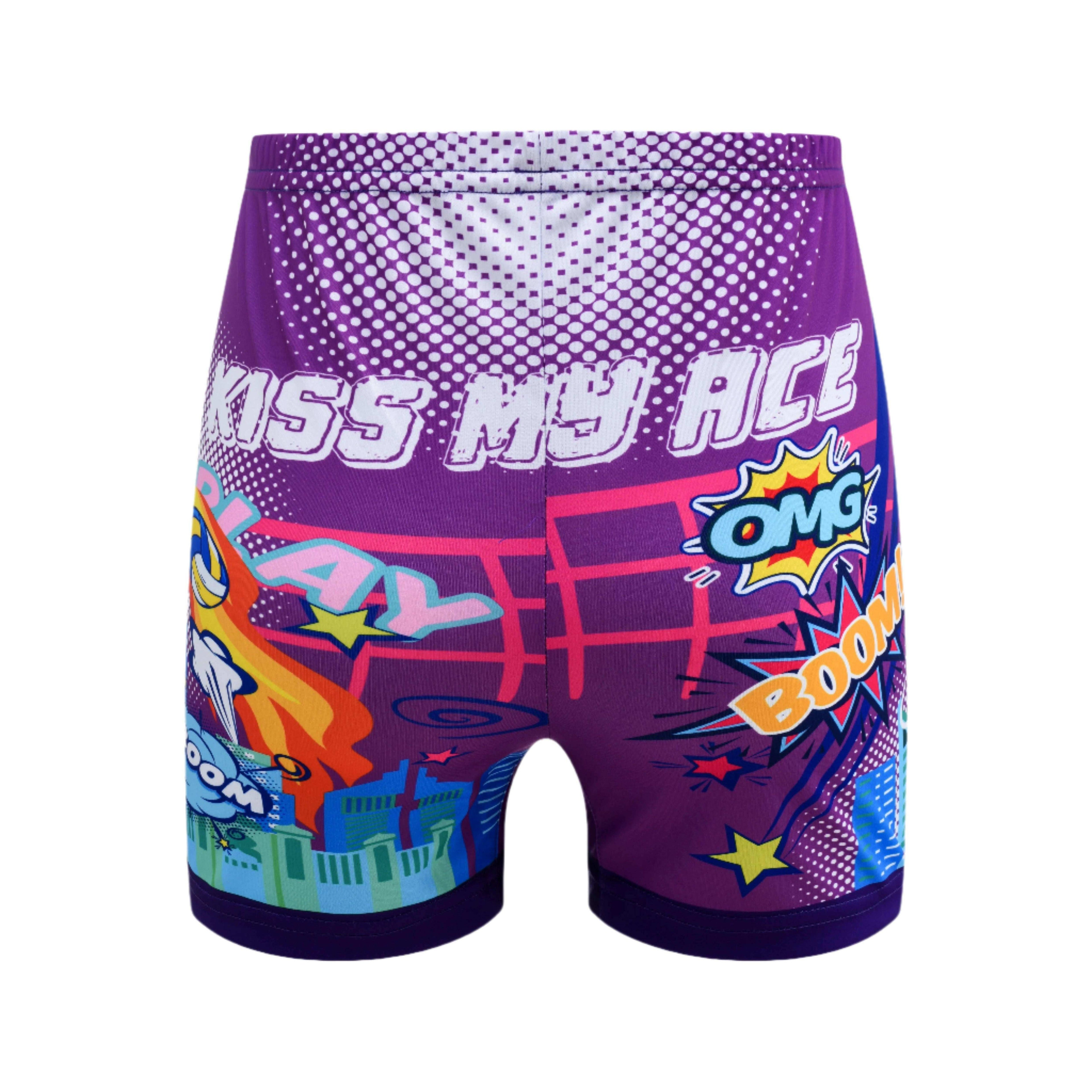 A pair of purple comic short shorts with a playful print, including text and graphics related to volleyball.